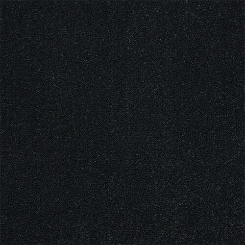 Black textured surface with subtle speckles.