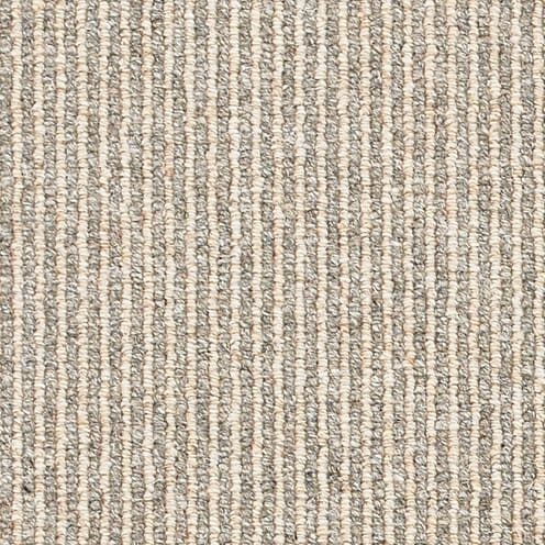 Beige and gray striped carpet texture.