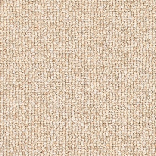 Beige textured carpet with looped pattern.