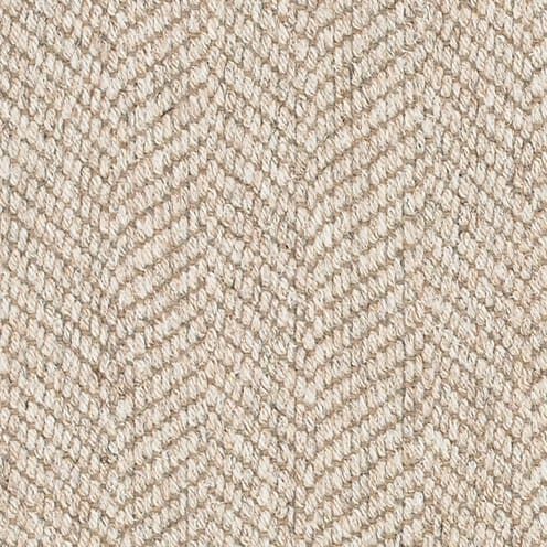 Beige herringbone woven fabric texture.