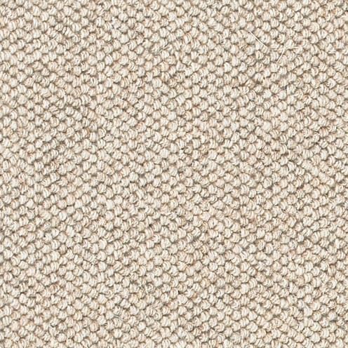 Beige textured carpet close-up pattern.