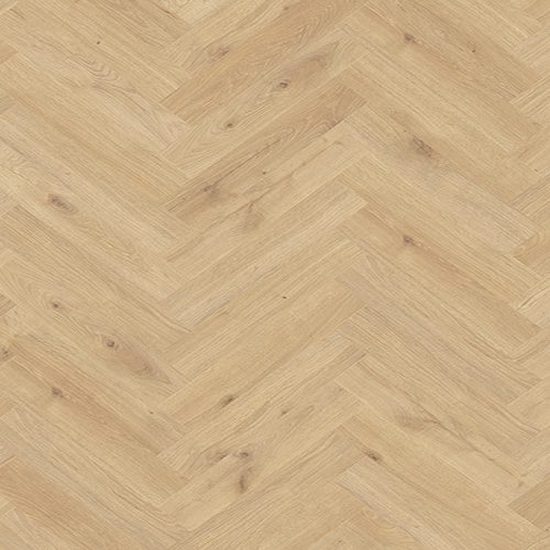 Close-up of Manor Herringbone Laminated flooring, featuring a repetitive zigzag design and light brown, natural wood grain.