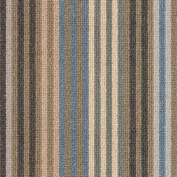 A close-up of Margo Selby Stripe Surf with alternating vertical bands in various colors, including shades of grey, blue, beige, and brown. The texture appears to be woven or knitted.