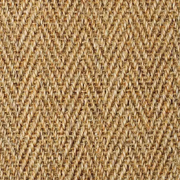Close-up of a woven fabric with a textured, chevron pattern in natural tan and brown tones.